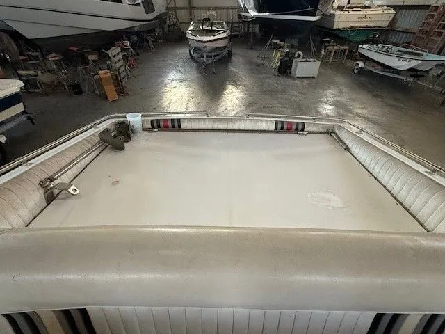 Slide: The Image of Interior of a 1983 Mirage 314 SZ boat in a storage facility. - 7