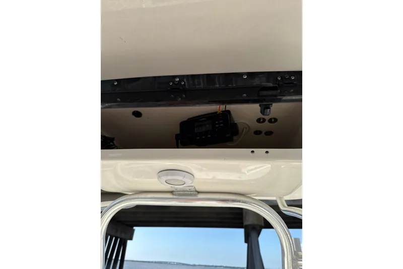 Slide: The Image of 2024 Key West 239 FS boat console with electronic controls and ocean view. - 6