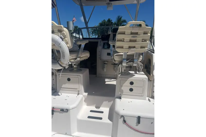 Slide: The Image of 2001 Grady-White Sailfish 282 boat interior with seating and storage compartments. - 4