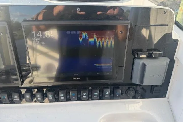 Slide: The Image of Control panel of a 2021 Sea Hunt Ultra 265 SE boat with Garmin display. - 7
