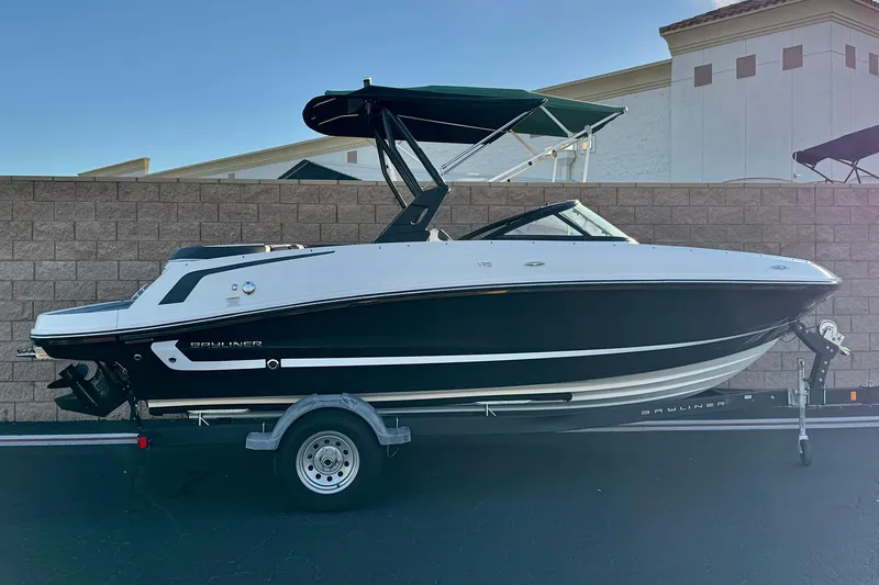 The Image of 2022 Bayliner VR5 Bowrider I/O on trailer, parked outdoors, side view. - 0