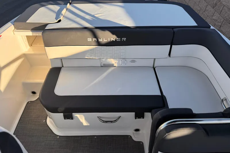 Slide: The Image of 2022 Bayliner VR5 Bowrider I/O interior seating with sleek black and white upholstery. - 15