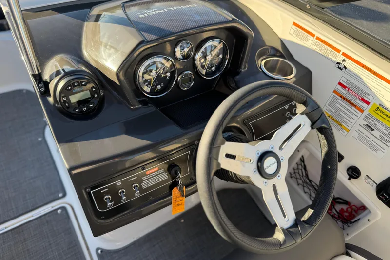 Slide: The Image of 2022 Bayliner VR5 Bowrider I/O dashboard with steering wheel and instrument panel. - 24