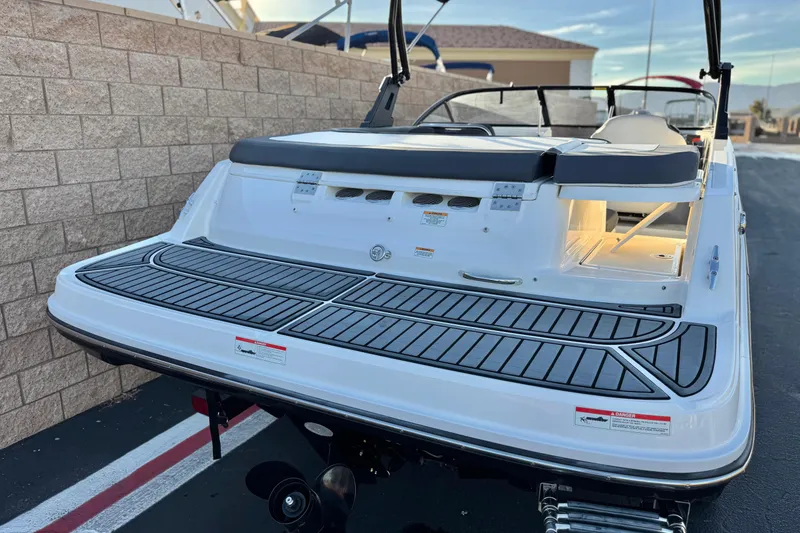 Slide: The Image of 2022 Bayliner VR5 Bowrider I/O boat with spacious swim platform and sleek design. - 6