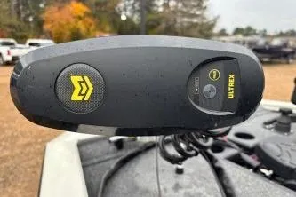 Slide: The Image of Close-up of 2023 Tracker Pro Team 195 TXW Tournament Edition boat control panel. - 12