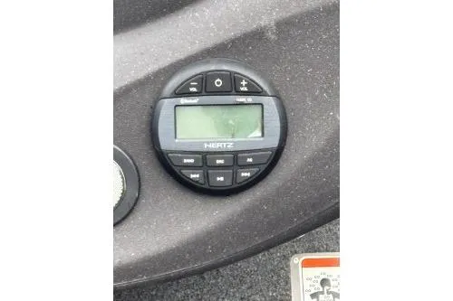 Slide: The Image of 2023 Tracker Pro Team 195 TXW Tournament Edition boat dashboard with Hertz audio control. - 13