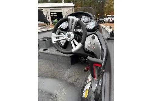 Slide: The Image of 2023 Tracker Pro Team 195 TXW Tournament Edition boat dashboard and steering wheel. - 9