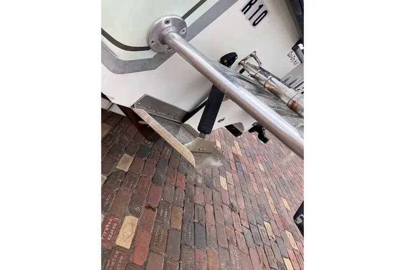 Slide: The Image of Rear view of a 2007 Coastal Bay 2310 boat on brick pavement. - 15