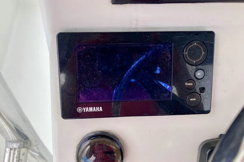 Slide: The Image of Yamaha display on 2007 Coastal Bay 2310 boat dashboard. - 25