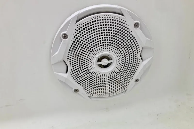 Slide: The Image of White speaker on a 2007 Coastal Bay 2310 boat interior. - 34