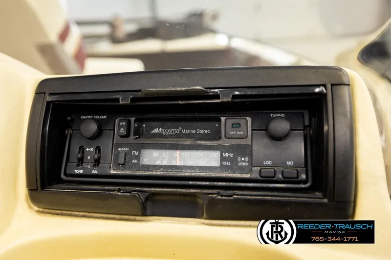 Slide: The Image of Maxxima marine stereo in 1999 Lowe Sea Nymph V 179 SCX boat dashboard. - 31