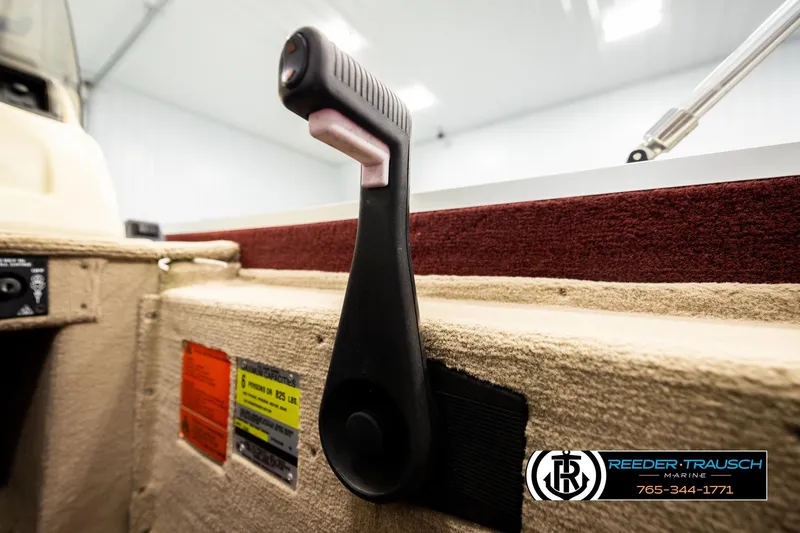 Slide: The Image of 1999 Lowe Sea Nymph V 179 SCX boat interior with handle and safety labels. - 35