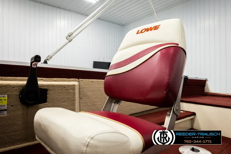 Slide: The Image of 1999 Lowe Sea Nymph V 179 SCX boat seat in red and white upholstery. - 36
