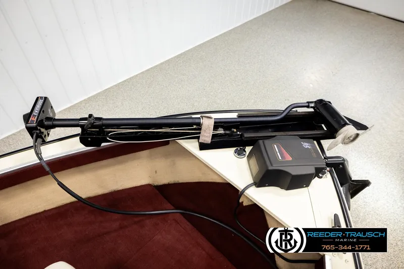 Slide: The Image of 1999 Lowe Sea Nymph V 179 SCX boat with trolling motor, Reeder-Trausch Marine logo visible. - 41