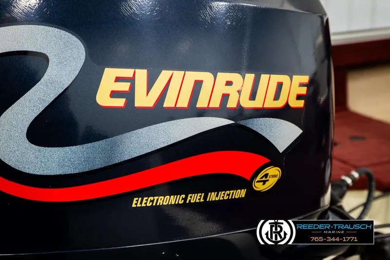 Slide: The Image of Evinrude outboard motor with electronic fuel injection on a 1999 Lowe Sea Nymph V 179 SCX. - 45
