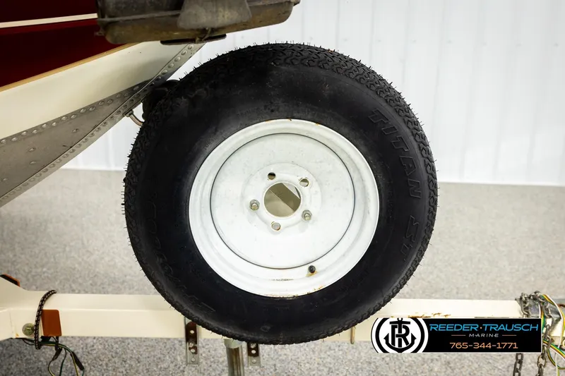 Slide: The Image of Trailer wheel of 1999 Lowe Sea Nymph V 179 SCX boat by Reeder-Trausch Marine. - 48