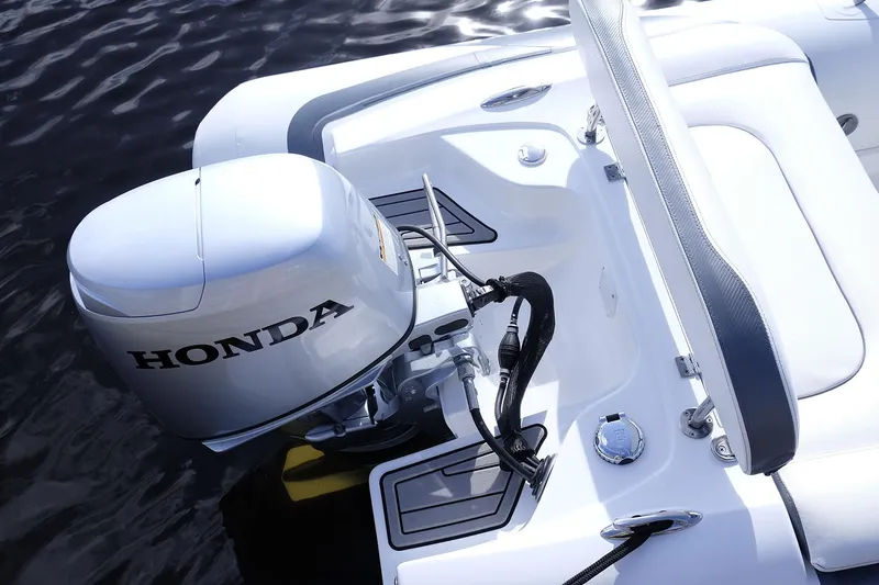 Slide: The Image of Manufacturer Provided Image: Walker Bay Generation 11 LTE 2025 boat with Honda outboard motor on water. - 10