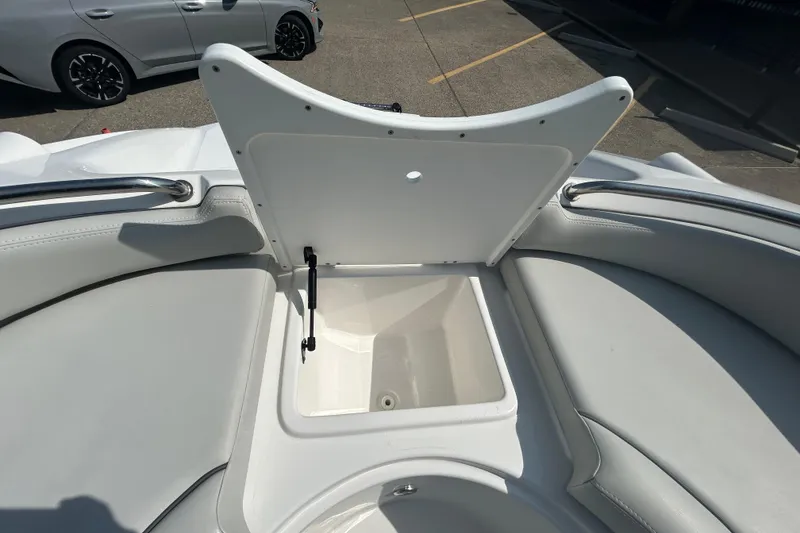 Slide: The Image of Open storage compartment on 2022 Sea Pro Citation 2400 boat, featuring cushioned seating. - 15