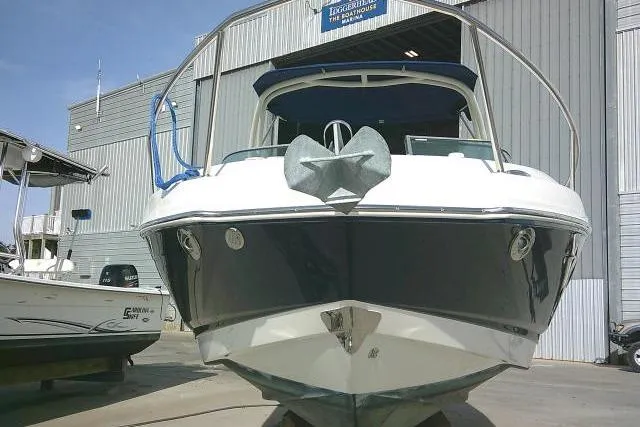 Slide: The Image of 2016 Chaparral 225 SSi boat docked at a marina, front view. - 3