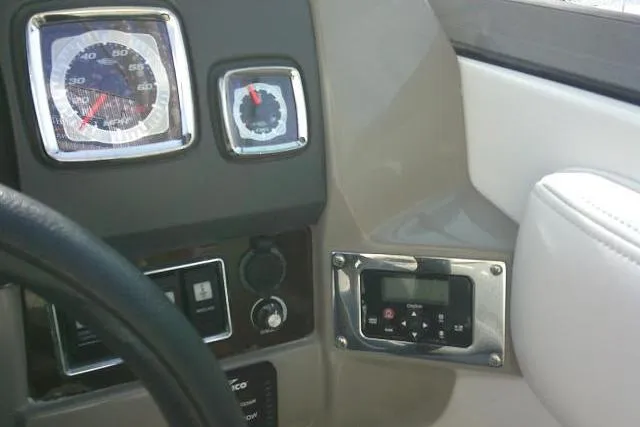 Slide: The Image of Dashboard of 2016 Chaparral 225 SSi boat with gauges and controls. - 42