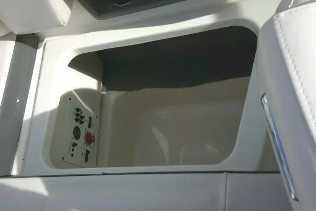 Slide: The Image of Storage compartment in 2016 Chaparral 225 SSi boat interior. - 45