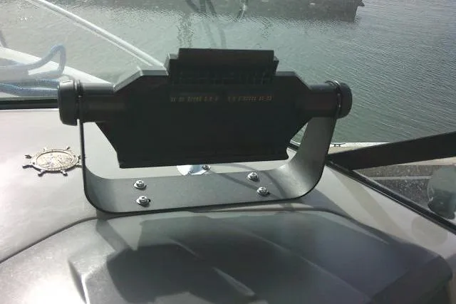 Slide: The Image of Dashboard of 2016 Chaparral 225 SSi boat with navigational equipment. - 46