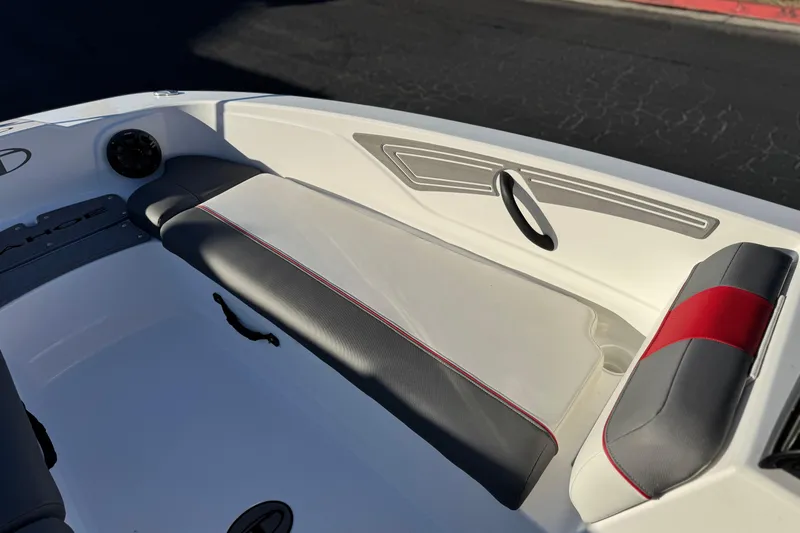 Slide: The Image of 2024 Tahoe T21 boat interior with sleek seating and modern design. - 11