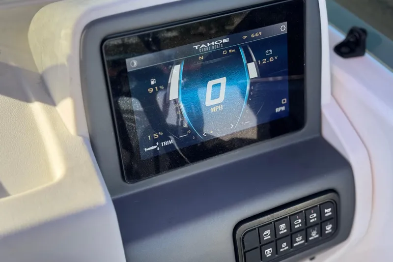 Slide: The Image of 2024 Tahoe T21 dashboard display showing speedometer and control panel. - 21