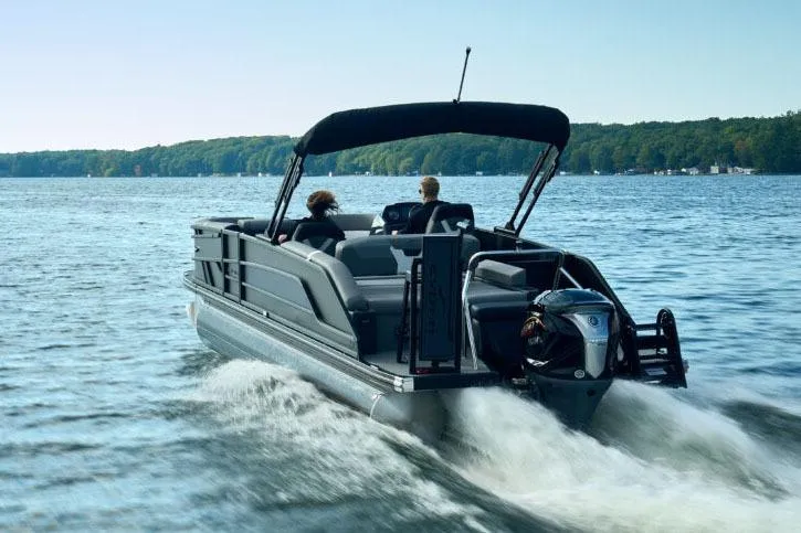 Slide: The Image of Captain's seat and steering wheel of 2026 Evotti 523CS boat interior. - 3