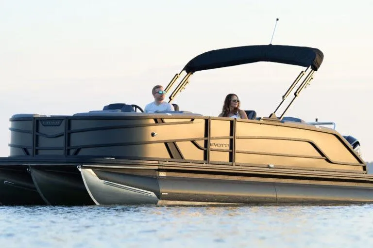 Slide: The Image of Luxurious interior of 2026 Evotti 523CS boat with plush seating and cup holders. - 4