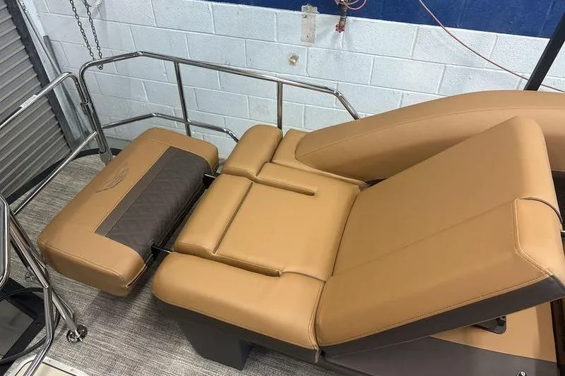 Slide: The Image of Luxurious tan seating on 2026 Bennington 24 MSL boat, featuring adjustable backrest and sleek design. - 5