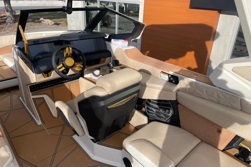 Slide: The Image of Luxurious interior of 2026 Nautique Super Air Nautique G25 Paragon boat. - 6