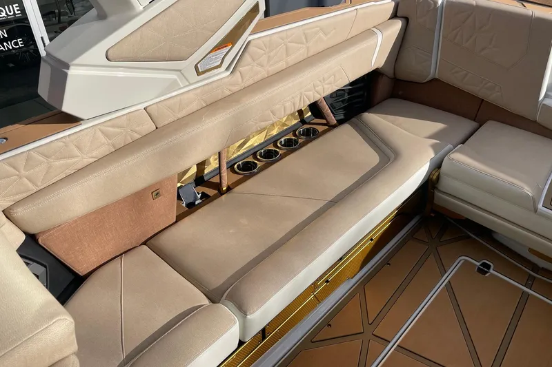 Slide: The Image of Luxurious interior seating of 2026 Nautique Super Air Nautique G25 Paragon boat. - 7