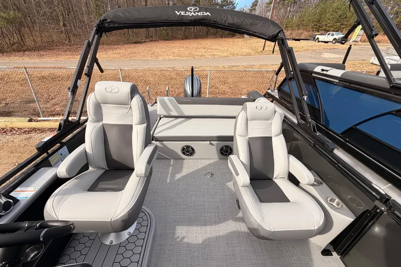 Slide: The Image of 2026 Veranda VR 235 VL boat interior with plush seating and sleek design. - 12