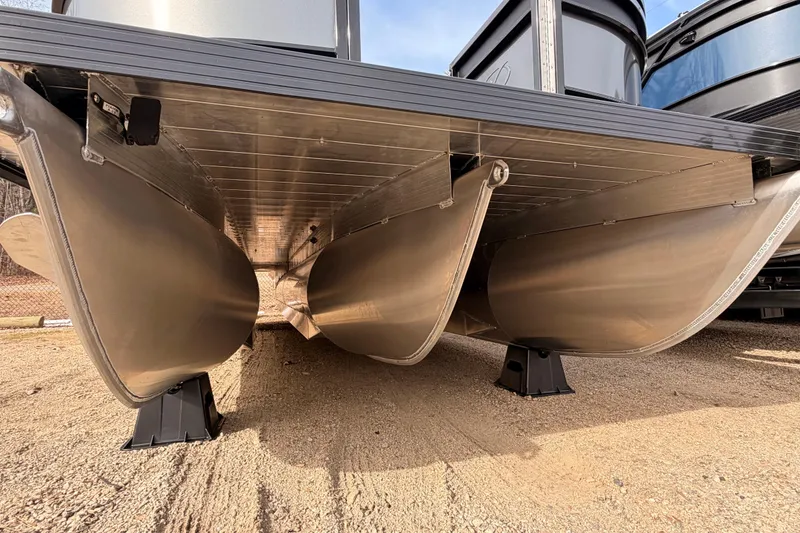 Slide: The Image of Underneath view of 2026 Veranda VR 235 VL pontoon boat, showcasing aluminum pontoons. - 2