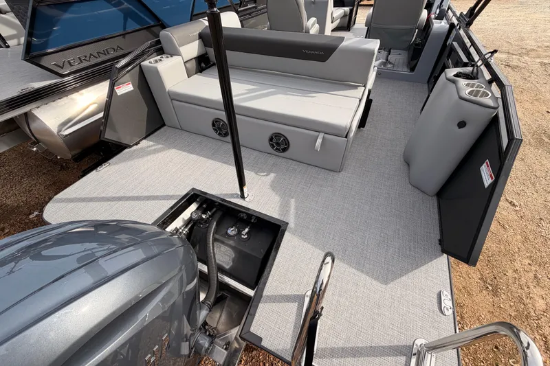 Slide: The Image of 2026 Veranda VR 235 VL pontoon boat interior with seating and engine compartment. - 5