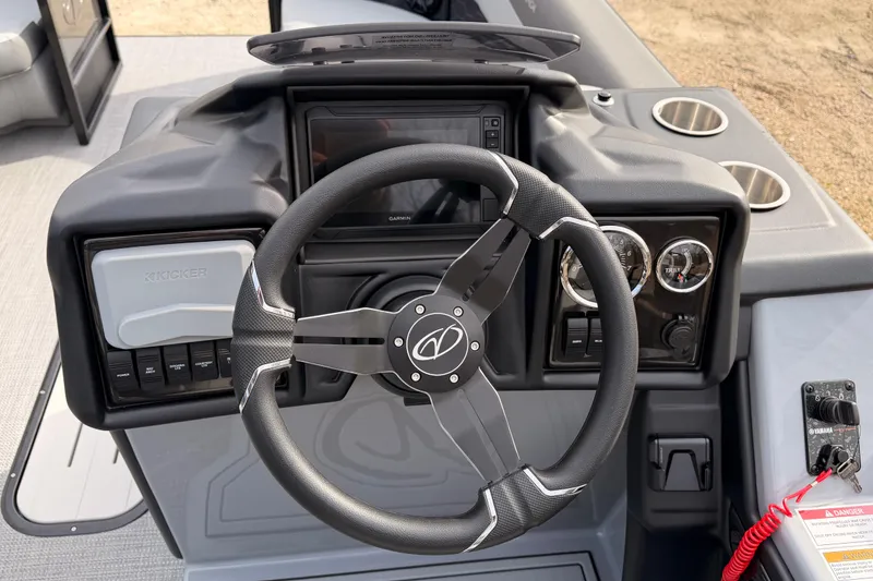 Slide: The Image of Steering console of 2026 Veranda VR 235 VL pontoon boat with modern controls and gauges. - 7