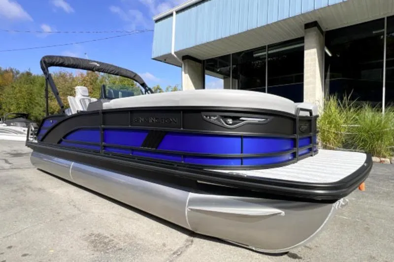 The Image of 2026 Bennington 24 M Swingback pontoon boat with sleek design and vibrant blue accents. - 0