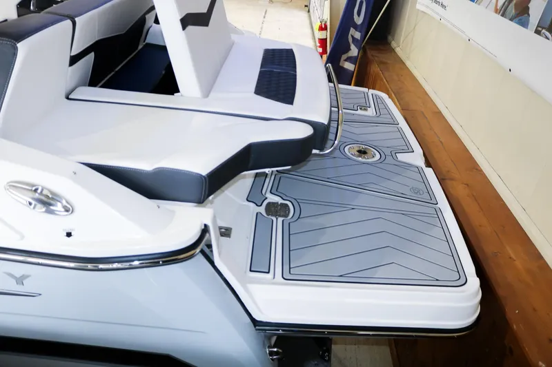 Slide: The Image of 2025 Monterey 278 Super Sport boat with sleek seating and swim platform. - 15