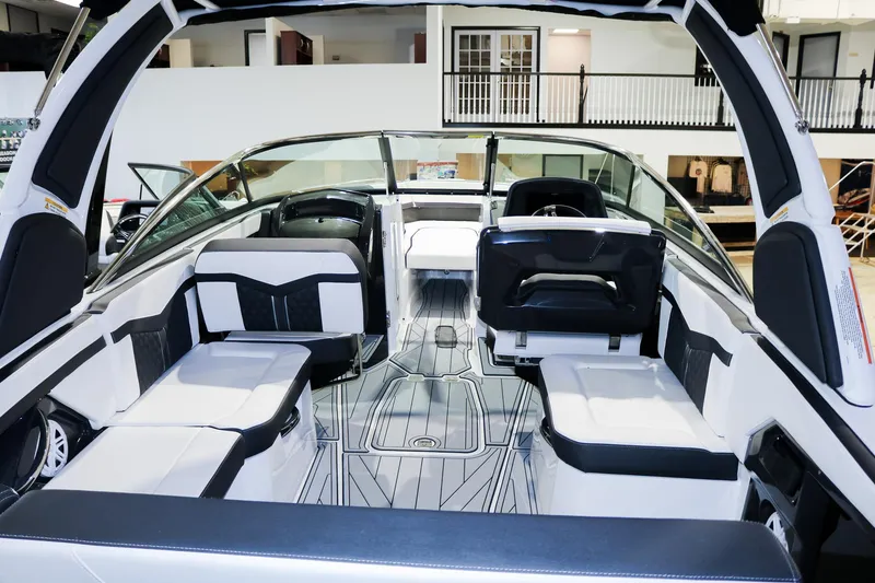 Slide: The Image of 2025 Monterey 278 Super Sport boat interior with sleek seating and modern design. - 4