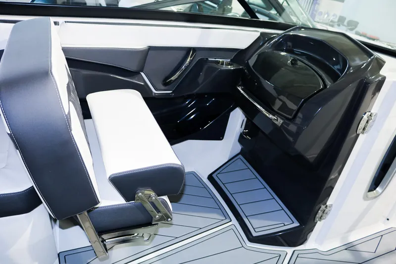 Slide: The Image of 2025 Monterey 278 Super Sport boat interior with modern seating and sleek dashboard design. - 7