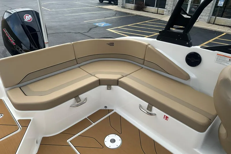 Slide: The Image of 2026 Bayliner V20 boat interior with tan seating and modern design. - 17
