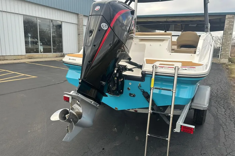 Slide: The Image of Rear view of a 2026 Bayliner V20 boat with outboard motor. - 3