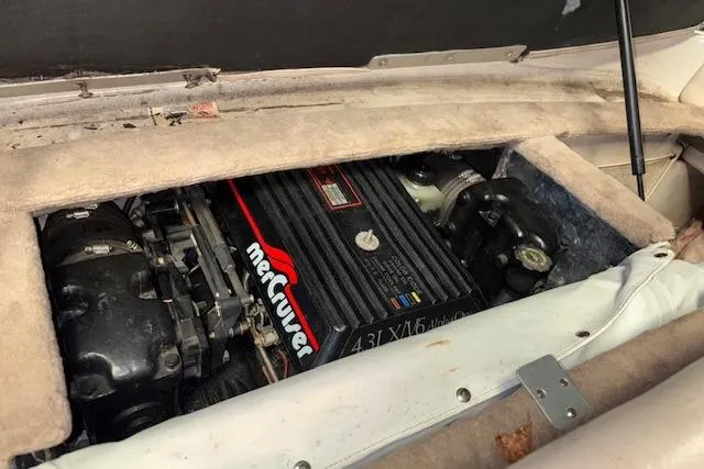 Slide: The Image of 1995 Crownline 180 BR boat engine compartment with MerCruiser 4.3L V6 engine. - 27