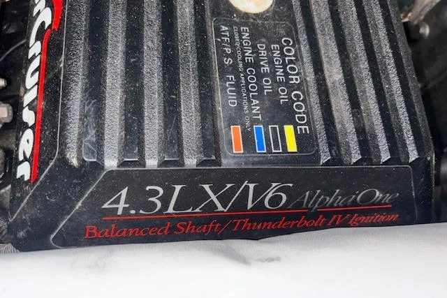 Slide: The Image of Engine cover of a 1995 Crownline 180 BR with 4.3LX V6 Alpha One. - 28