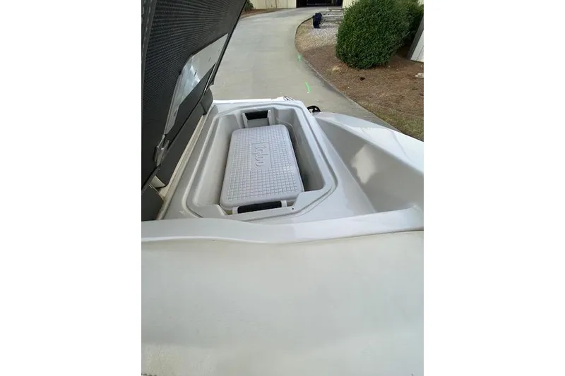 Slide: The Image of 2013 Chaparral 226 SSi boat with built-in cooler storage compartment. - 14
