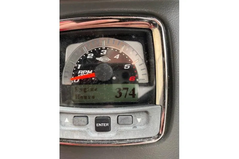 Slide: The Image of Close-up of 2013 Chaparral 226 SSi tachometer showing 374 engine hours. - 15