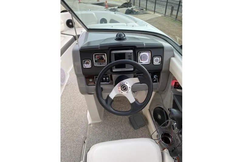 Slide: The Image of Steering console of 2013 Chaparral 226 SSi boat with gauges and controls. - 5