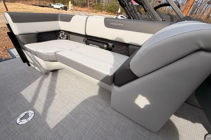 Slide: The Image of 2026 Veranda VR 235 RC boat interior with gray seating and modern design. - 11