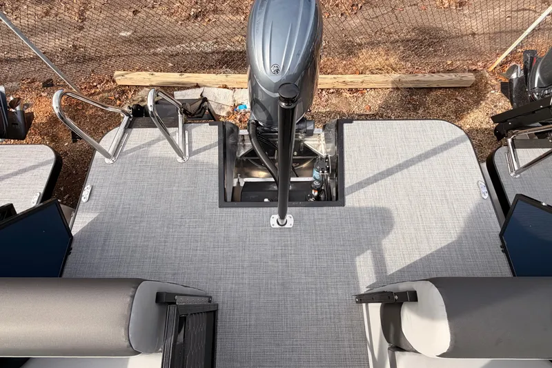 Slide: The Image of 2026 Veranda VR 235 RC boat deck with motor and seating area. - 13